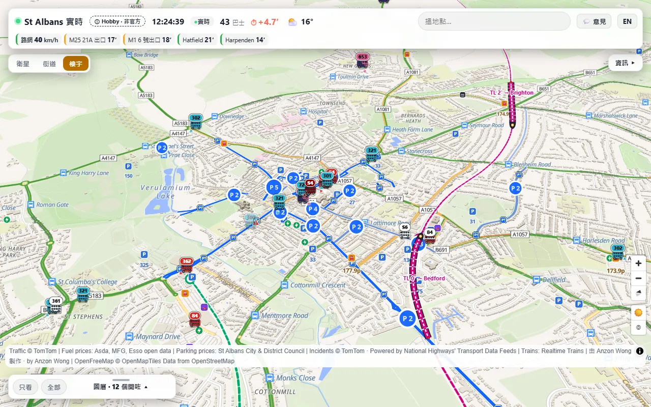 The map by day: buses in their liveries, a Thameslink train, car parks, pay and display streets and fuel prices over 3D buildings